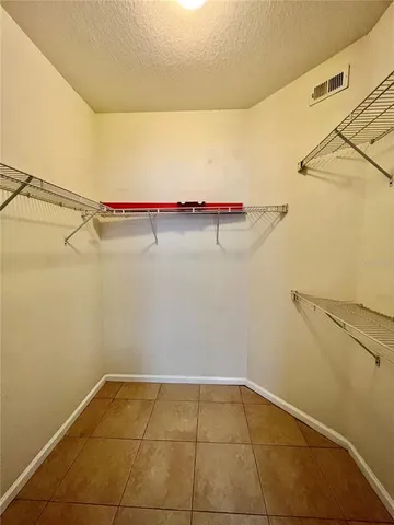 a view of a glass door with a yard