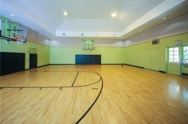 a very nice looking living room with furniture and a large window