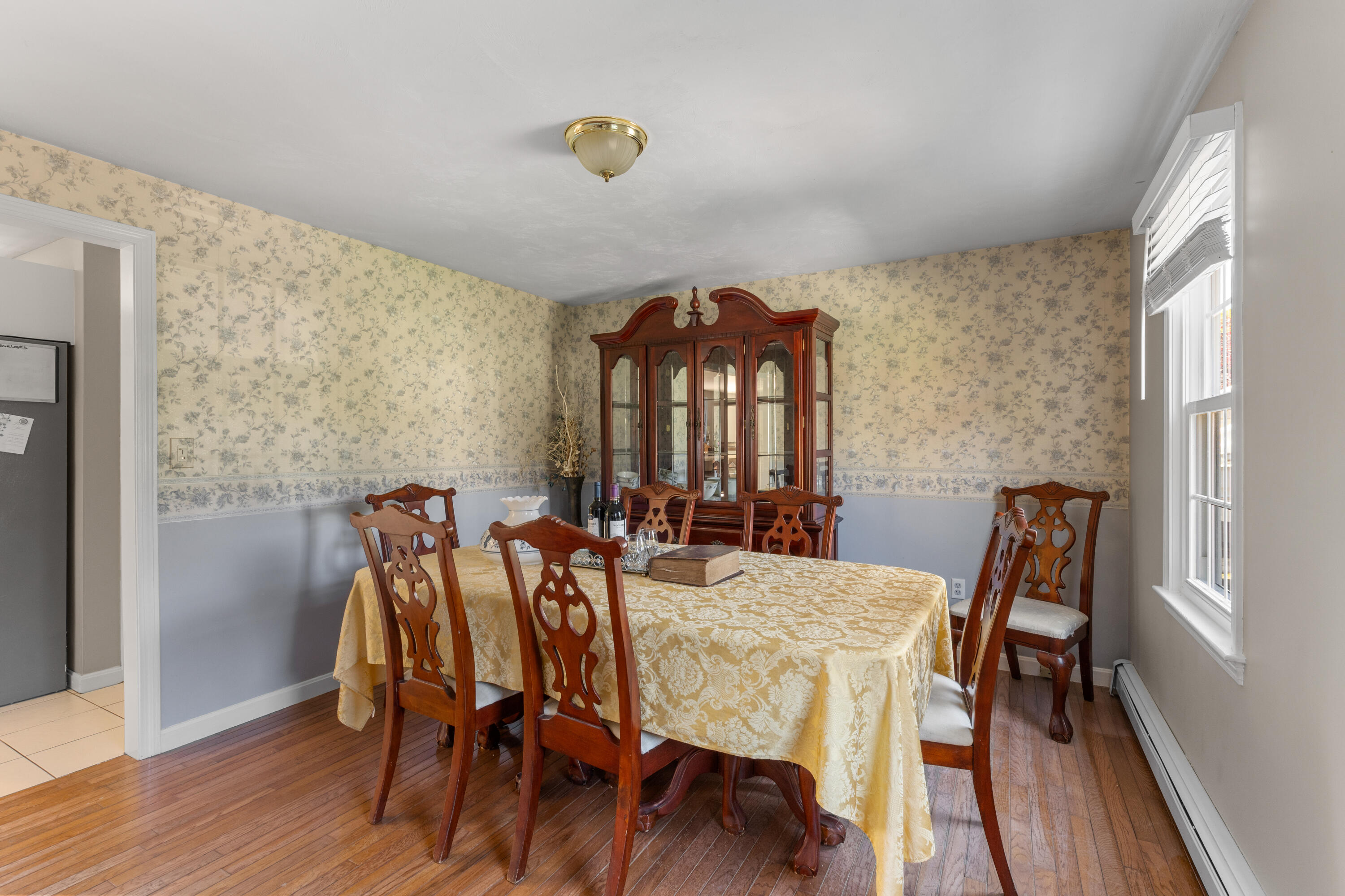 30 Sheffield Place Mashpee, MA 02649 - Photo 10 of 38 a view of a dining room with furniture and wooden floor