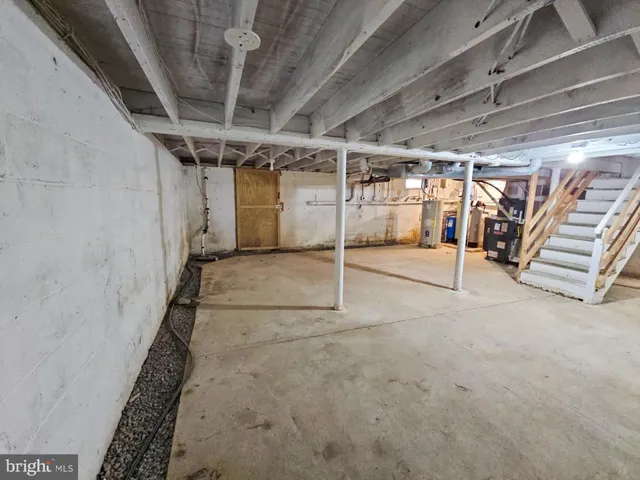 a view of a empty room with stairs