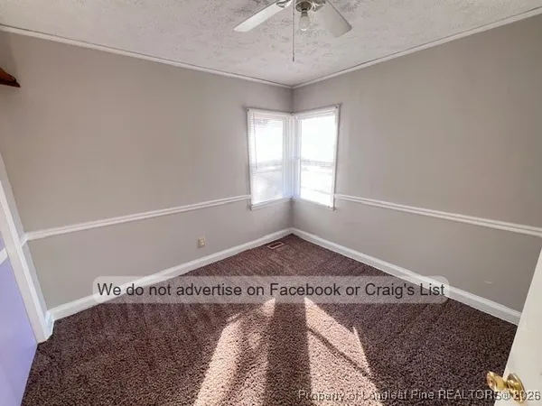 a view of a room with a window