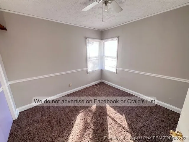 a view of a room with a window