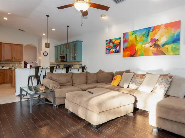 a living room with furniture and a couch