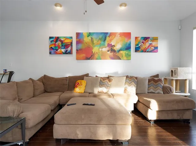 a bedroom with a bed and a table in it