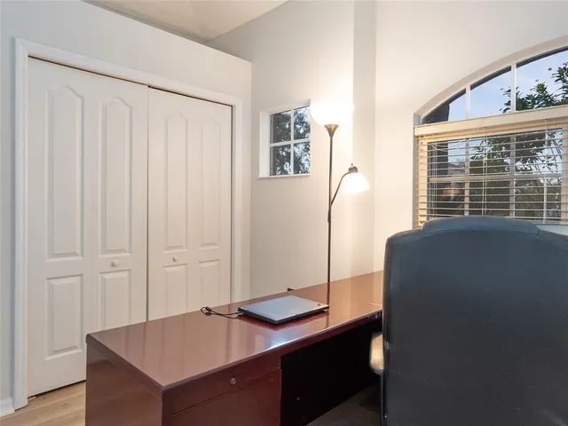 a view of a swimming pool with a porch