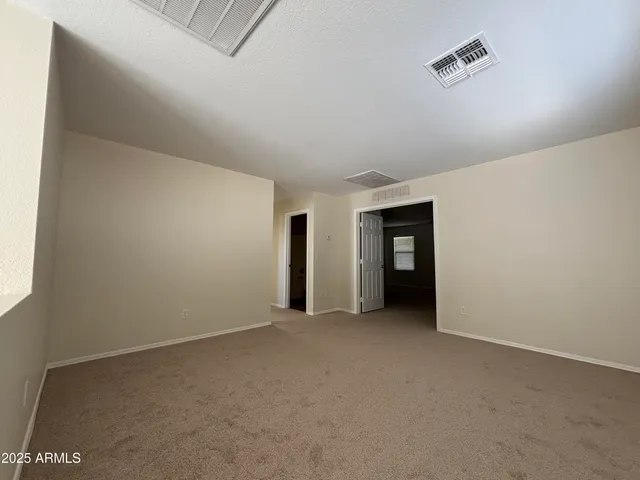 an empty room with an entryway