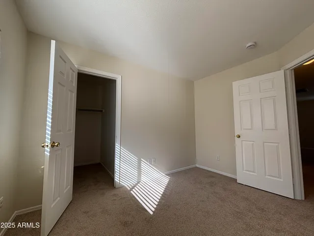 a view of a livingroom with a hallway