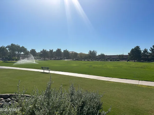 a view of a lake with a big yard