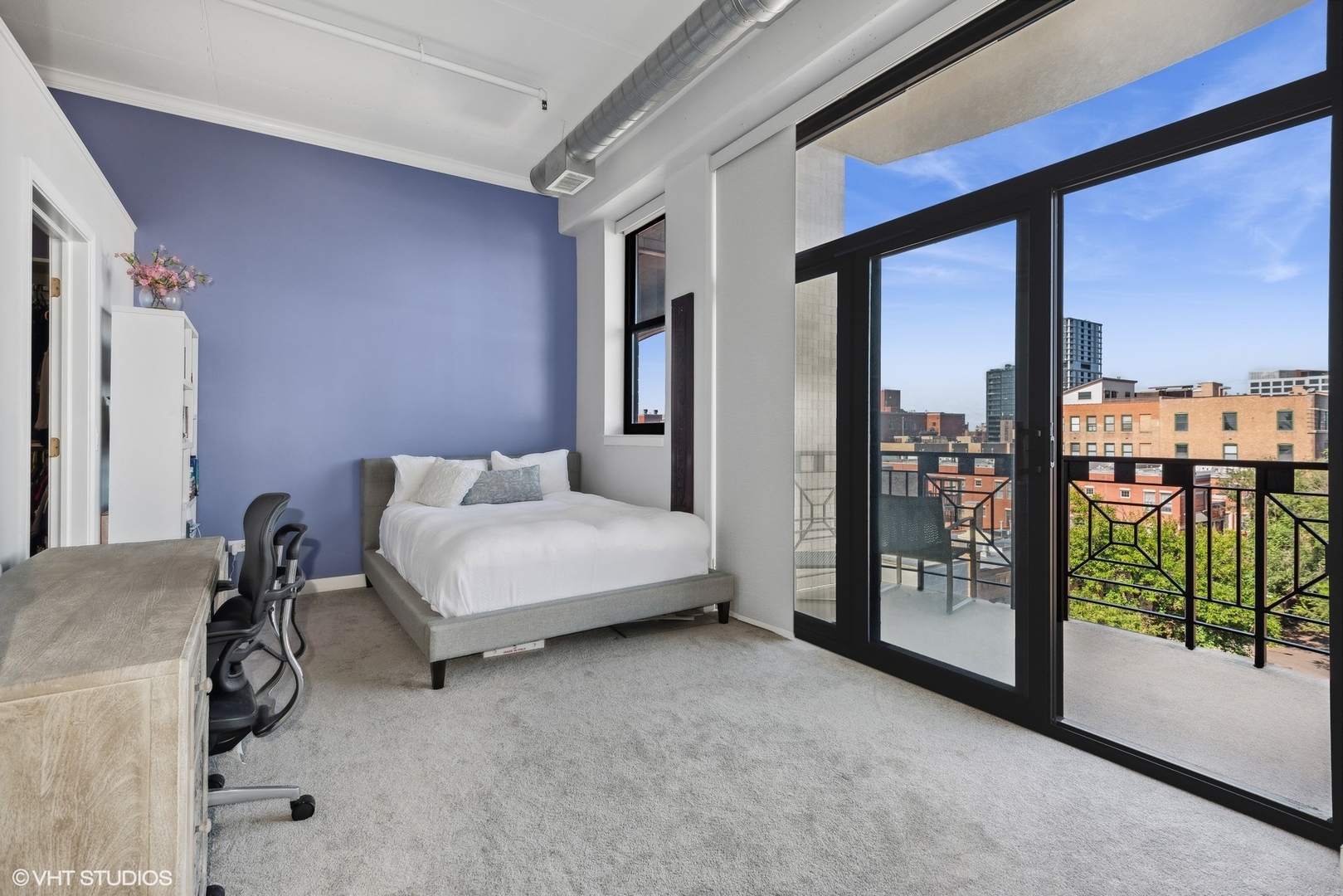 1301 West Madison Street, Unit 501 Chicago, IL 60607 - Photo 15 of 30 a living room with furniture and a floor to ceiling window
