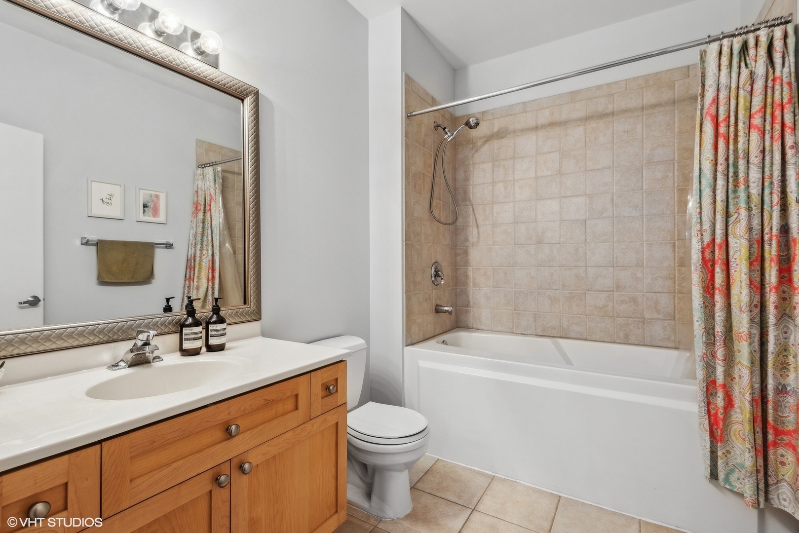 1301 West Madison Street, Unit 501 Chicago, IL 60607 - Photo 20 of 30 a bathroom with a sink toilet and shower