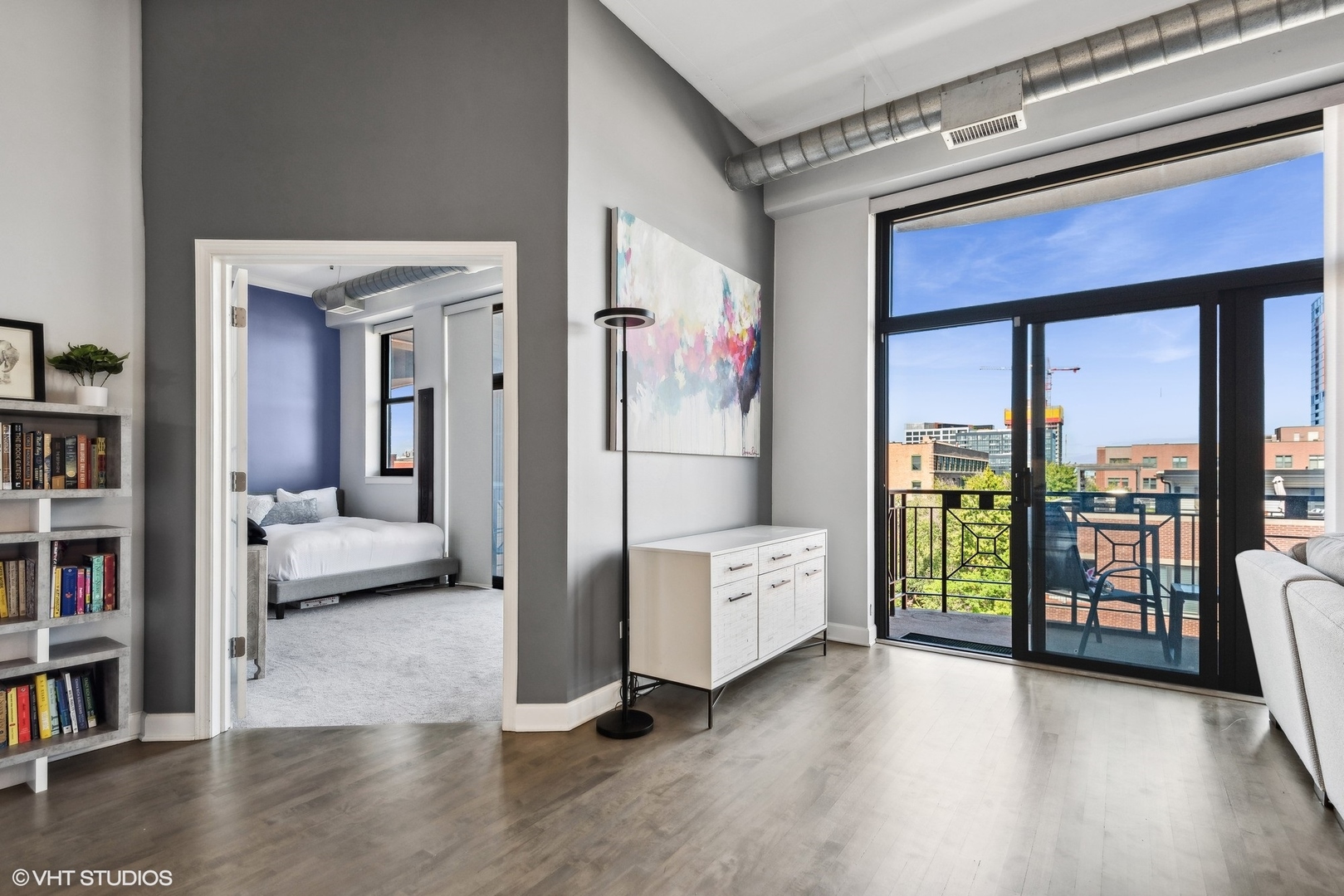 1301 West Madison Street, Unit 501 Chicago, IL 60607 - Photo 6 of 30 a living room with furniture and a floor to ceiling window