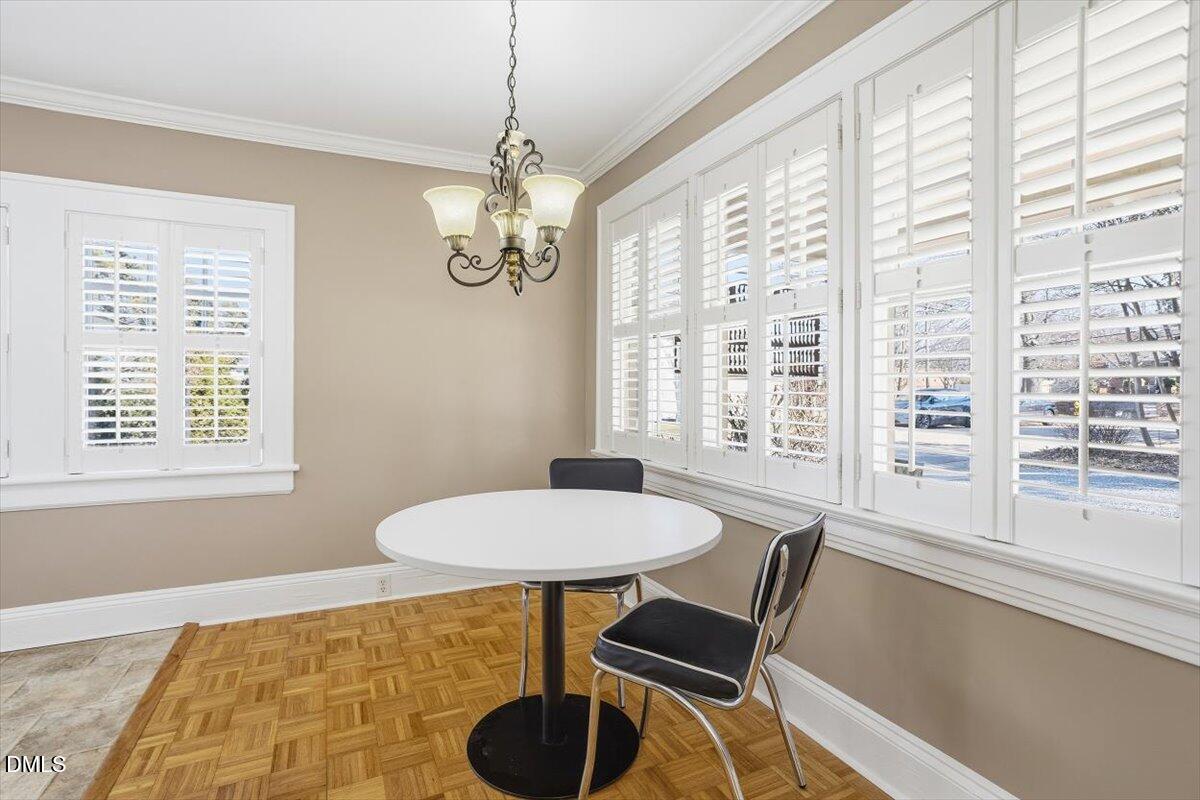 2609 Davis Street Raleigh, NC 27608 - Photo 18 of 31 a view of a dining room with furniture window and outside view