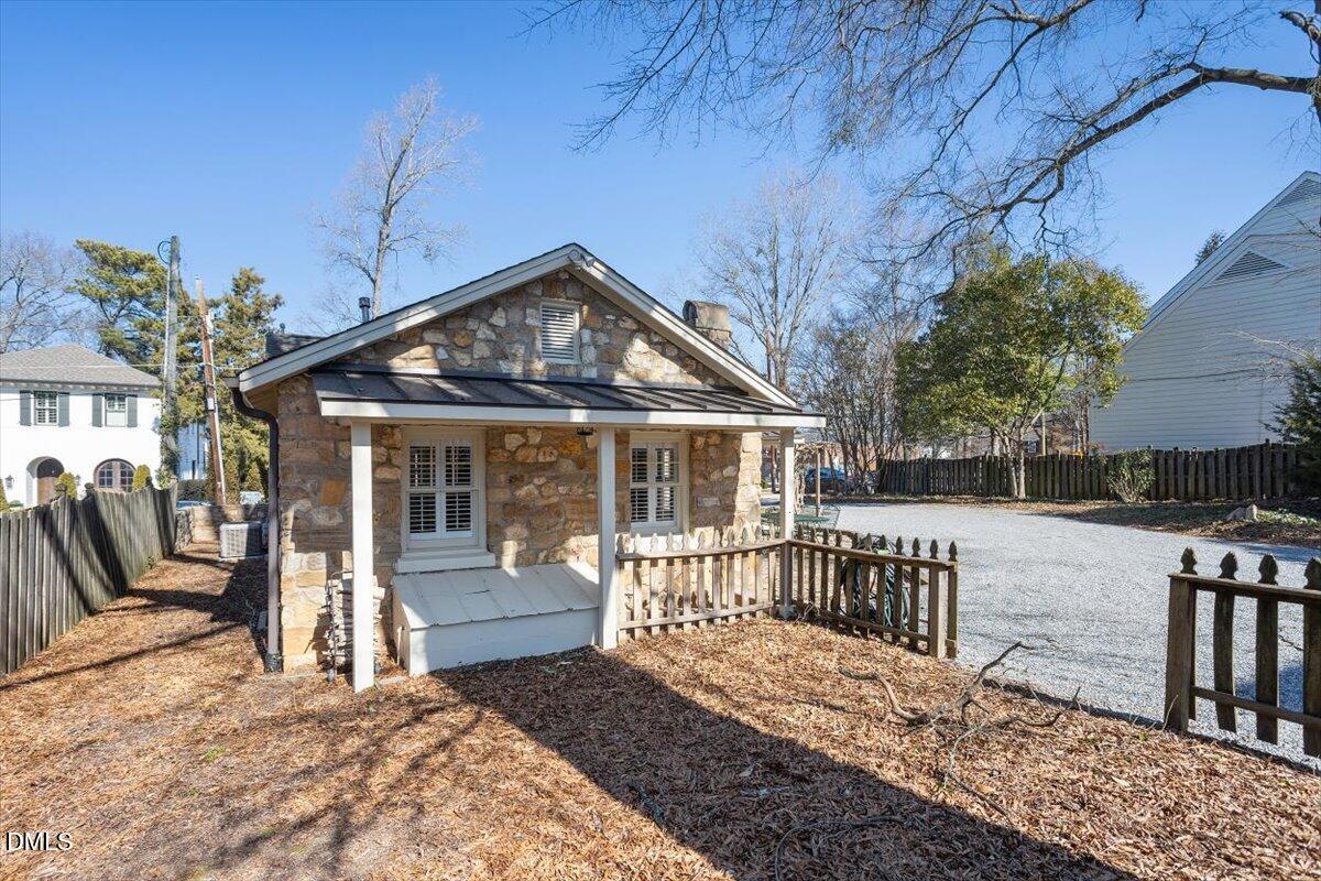 2609 Davis Street Raleigh, NC 27608 - Photo 6 of 31 a front view of a house with a yard