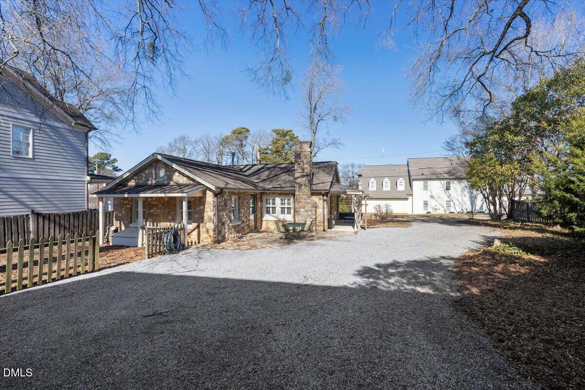 2609 Davis Street Raleigh, NC 27608 - Photo 8 of 31 a view of a large house with a street