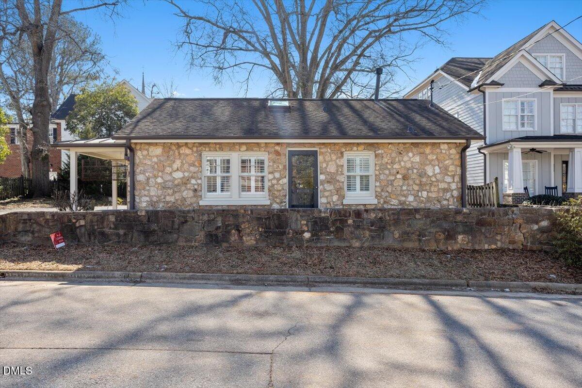 2609 Davis Street Raleigh, NC 27608 - Photo 10 of 31 a front view of a house with a yard
