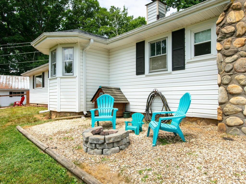 760 Kims Cove Road Canton, NC 28716 - Photo 34 of 37 a view of house with outdoor seating space