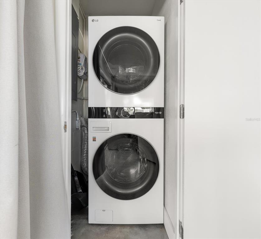 127 11th Avenue Indian Rocks Beach, FL 33785 - Photo 22 of 63 a utility room with dryer and washer
