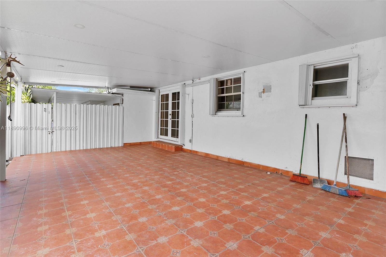 450 Northwest 40th Court Miami, FL 33126 - Photo 15 of 18 a view of a livingroom with an empty space