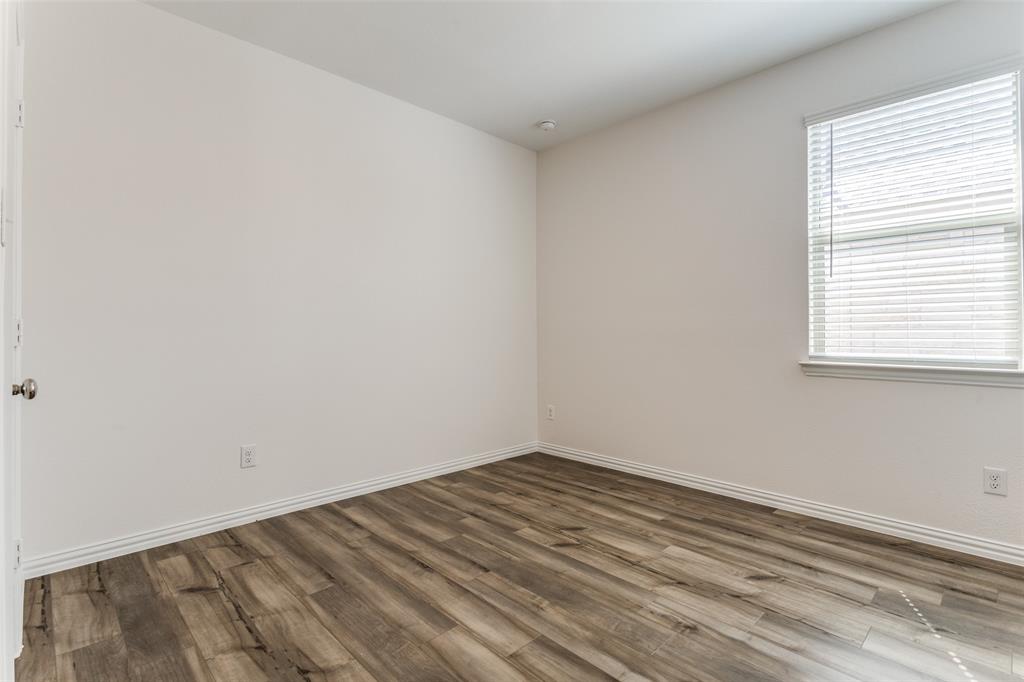 1207 Mesquite Lane Princeton, TX 75407 - Photo 12 of 25 wooden floor in a room