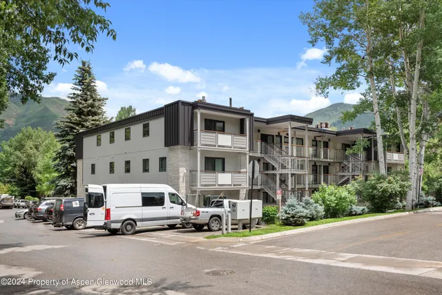 a car parked in front of a building