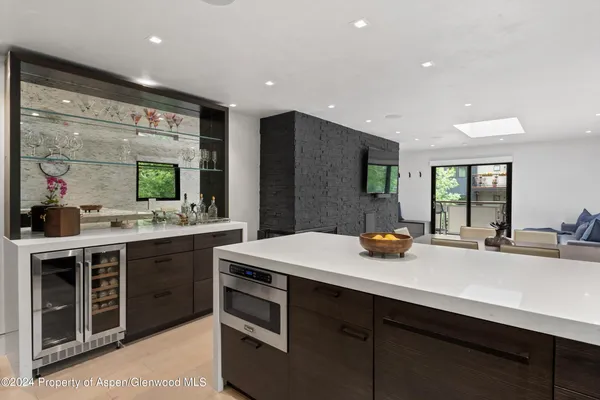 a kitchen with a sink and cabinets