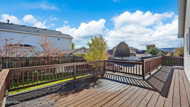a view of balcony with wooden floor