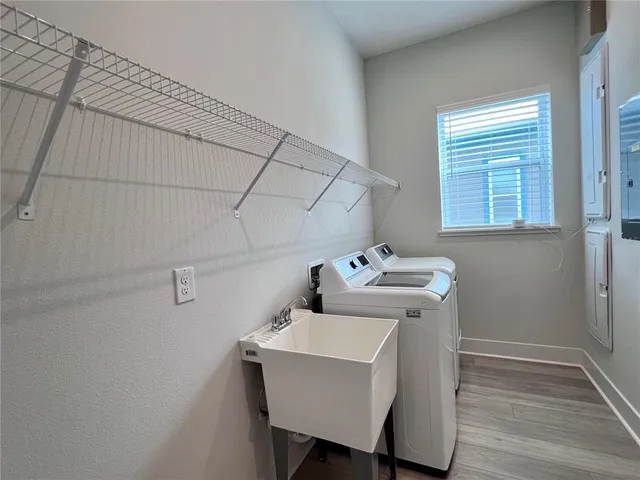 a white bath tub sitting in a bathroom