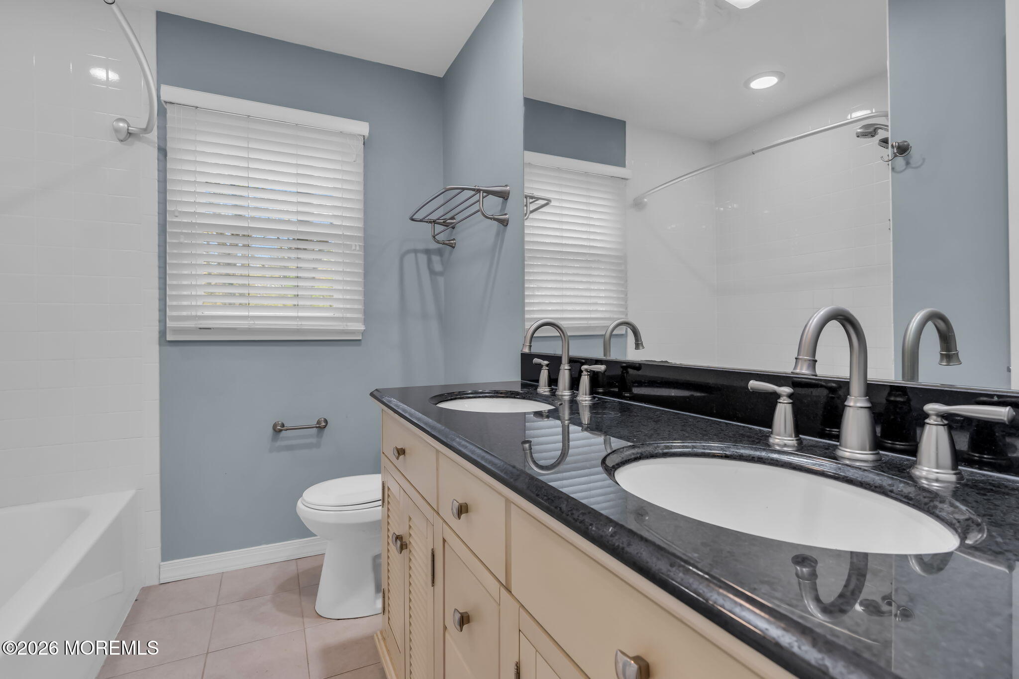593 Beach Plum Road Brick, NJ 08723 - Photo 27 of 38 a bathroom with a granite countertop double vanity sink a mirror and a toilet