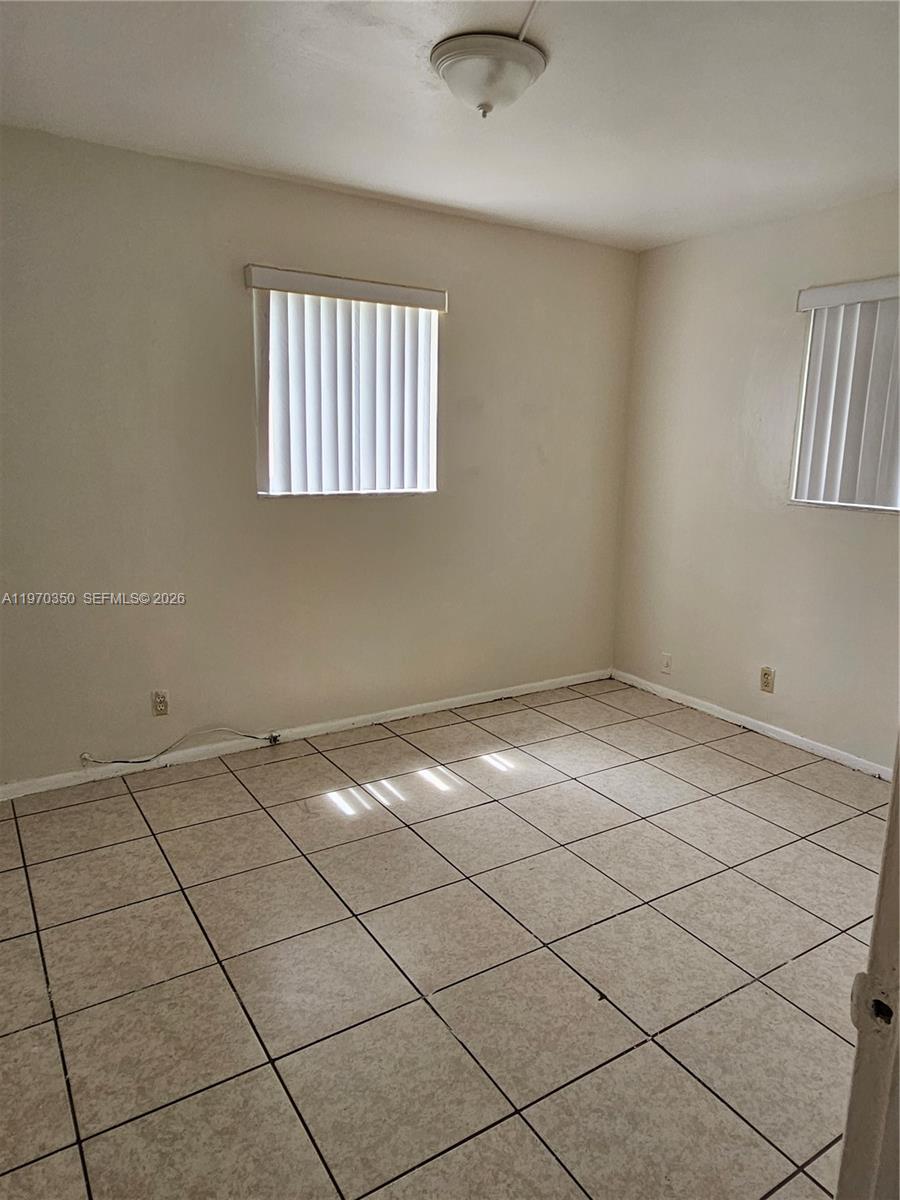 5820 Northwest 19th Street, Unit B Sunrise, FL 33313 - Photo 11 of 15 a view of a livingroom and window