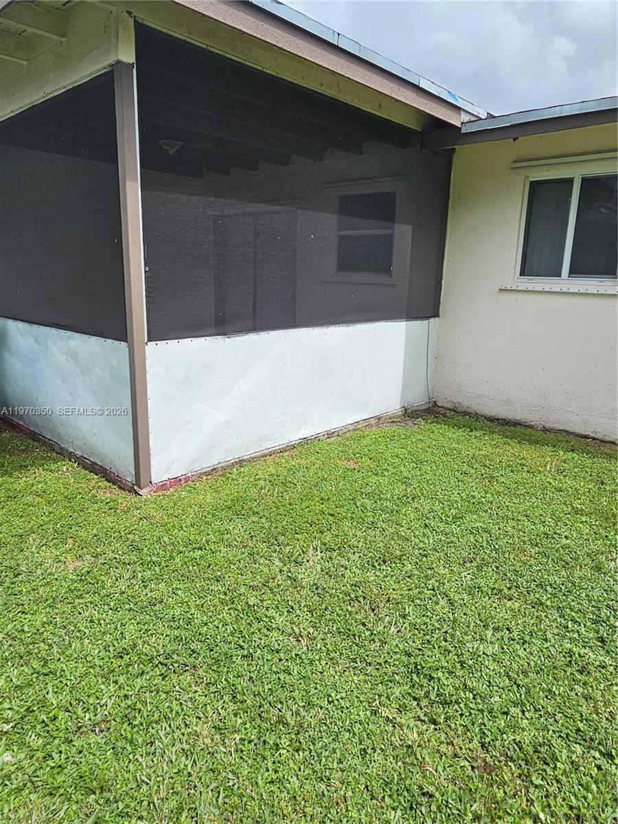 5820 Northwest 19th Street, Unit B Sunrise, FL 33313 - Photo 14 of 15 a view of yard