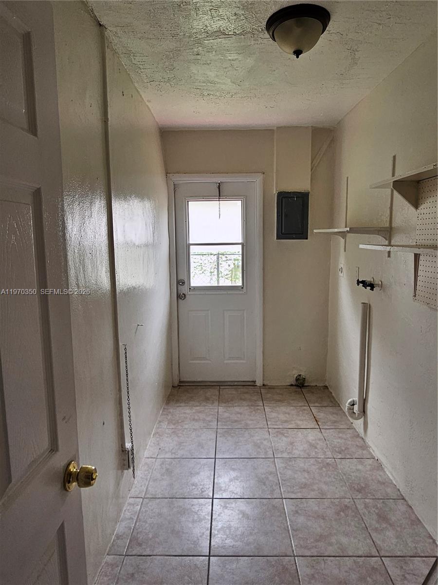 5820 Northwest 19th Street, Unit B Sunrise, FL 33313 - Photo 15 of 15 a view of a livingroom with a kitchen