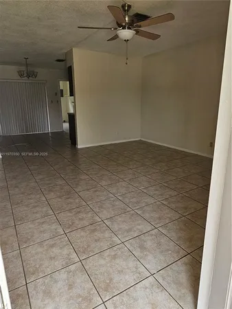 a view of a livingroom and a bathroom
