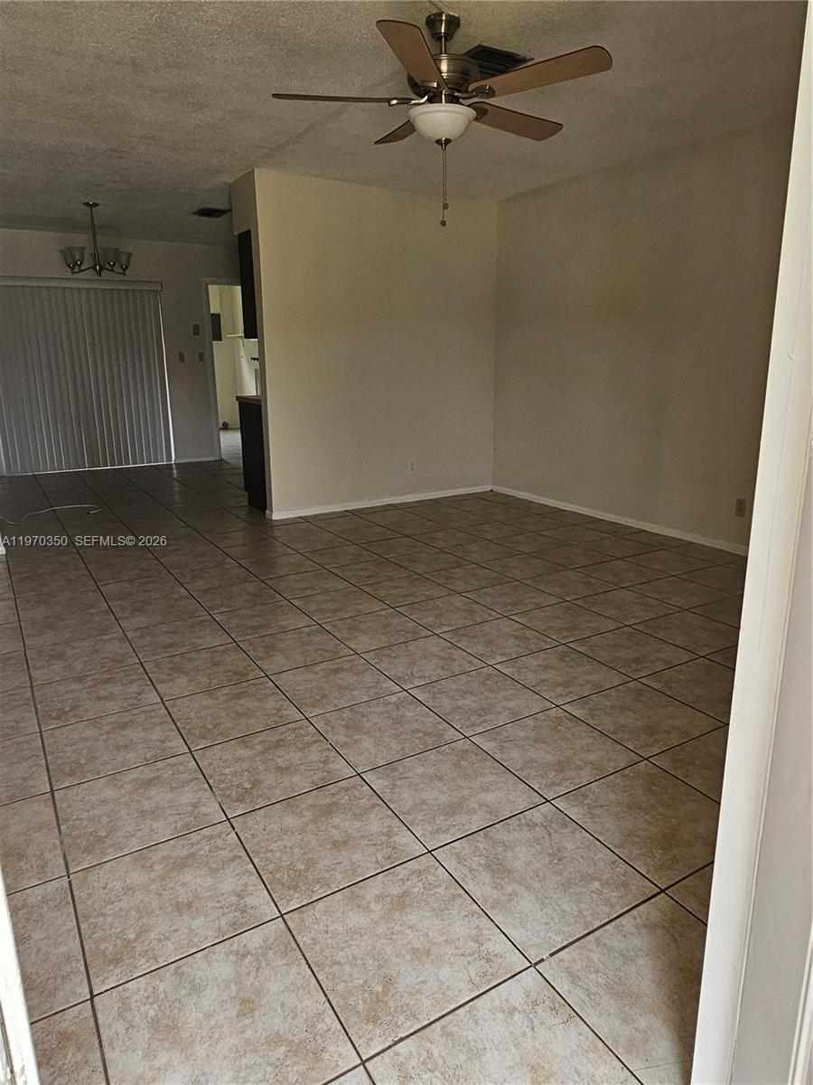 5820 Northwest 19th Street, Unit B Sunrise, FL 33313 - Photo 3 of 15 a view of a livingroom and a bathroom