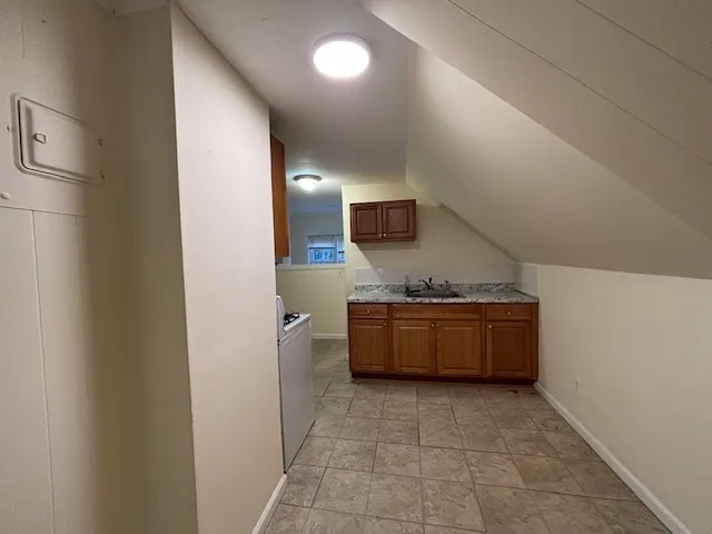 a large bathroom with a large tub shower and vanity