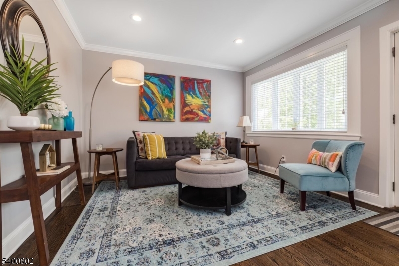 66 Hughes Street Maplewood, NJ 07040 - Photo 3 of 18 a living room with furniture and a rug