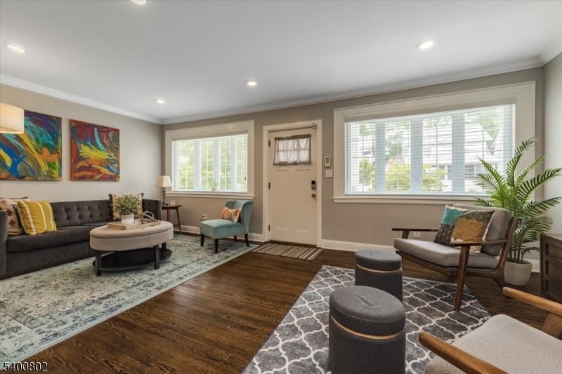 66 Hughes Street Maplewood, NJ 07040 - Photo 4 of 18 a living room with furniture and a large window