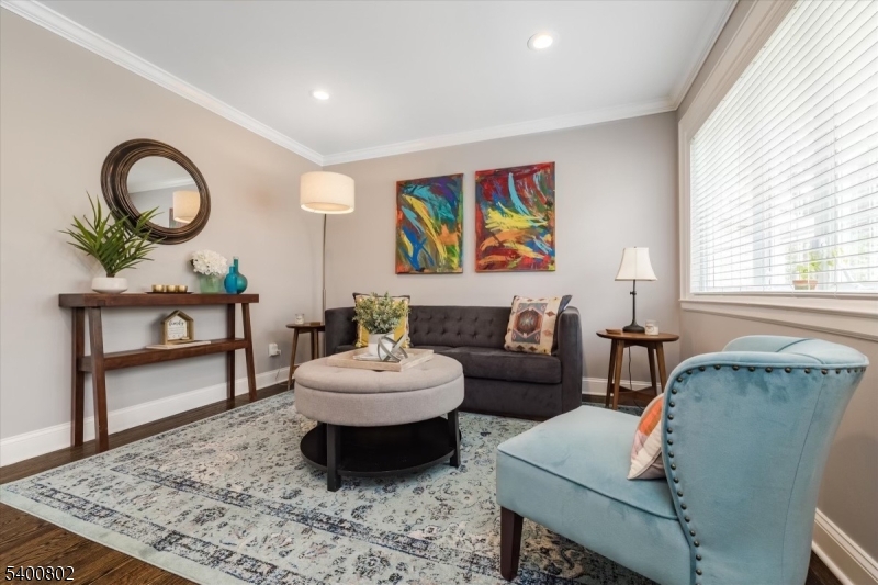 66 Hughes Street Maplewood, NJ 07040 - Photo 5 of 18 a living room with furniture and a rug
