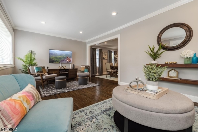 66 Hughes Street Maplewood, NJ 07040 - Photo 6 of 18 a living room with furniture and a flat screen tv