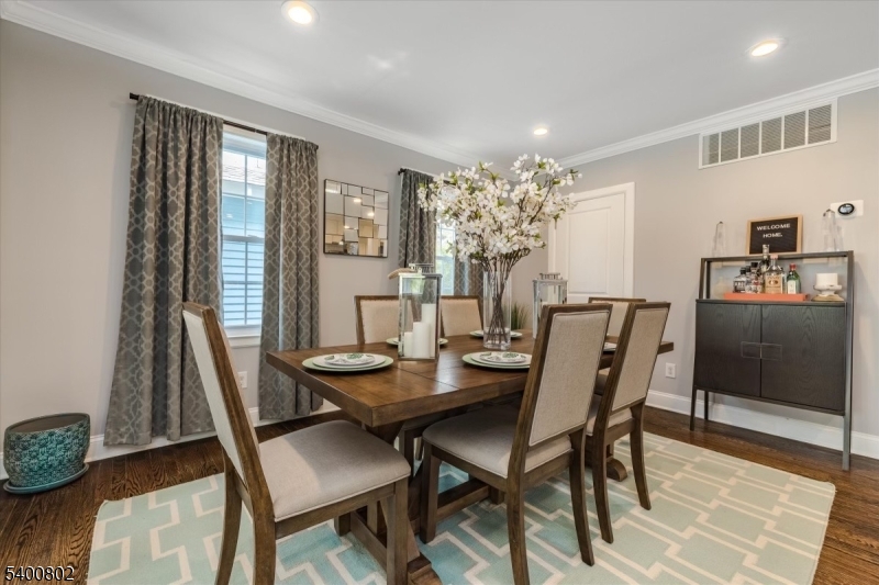 66 Hughes Street Maplewood, NJ 07040 - Photo 7 of 18 a view of a dining room with furniture and wooden floor