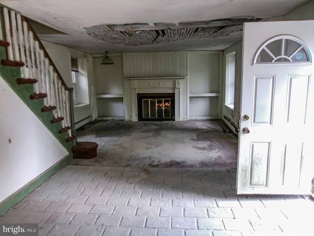 a view of a livingroom with a staircase