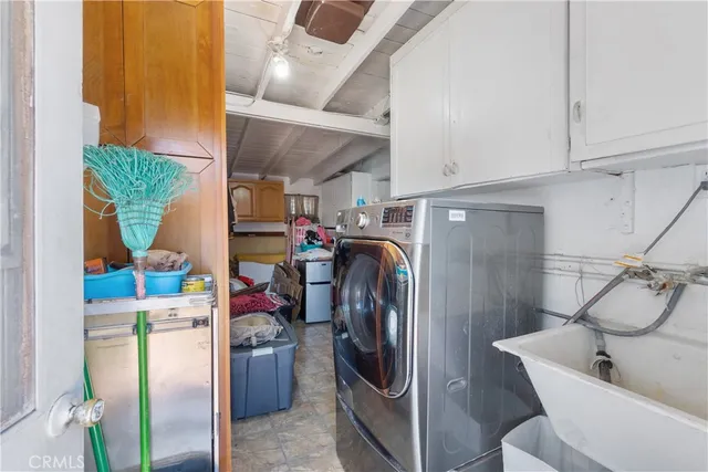 a storage room with washer and dryer