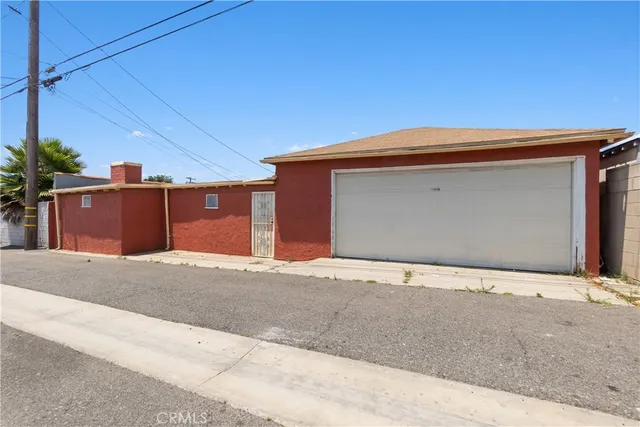 a front view of a house with a garage