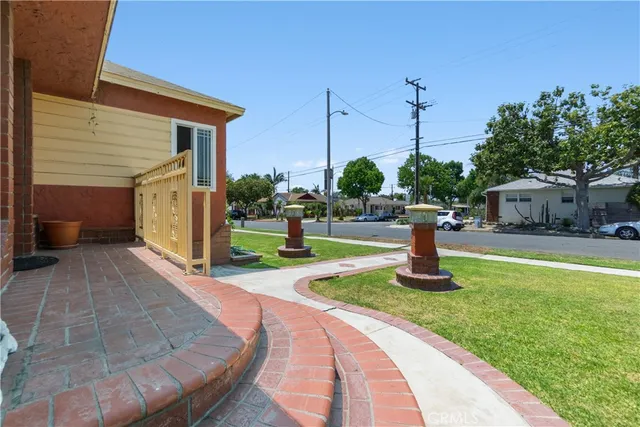 a house view with a garden space