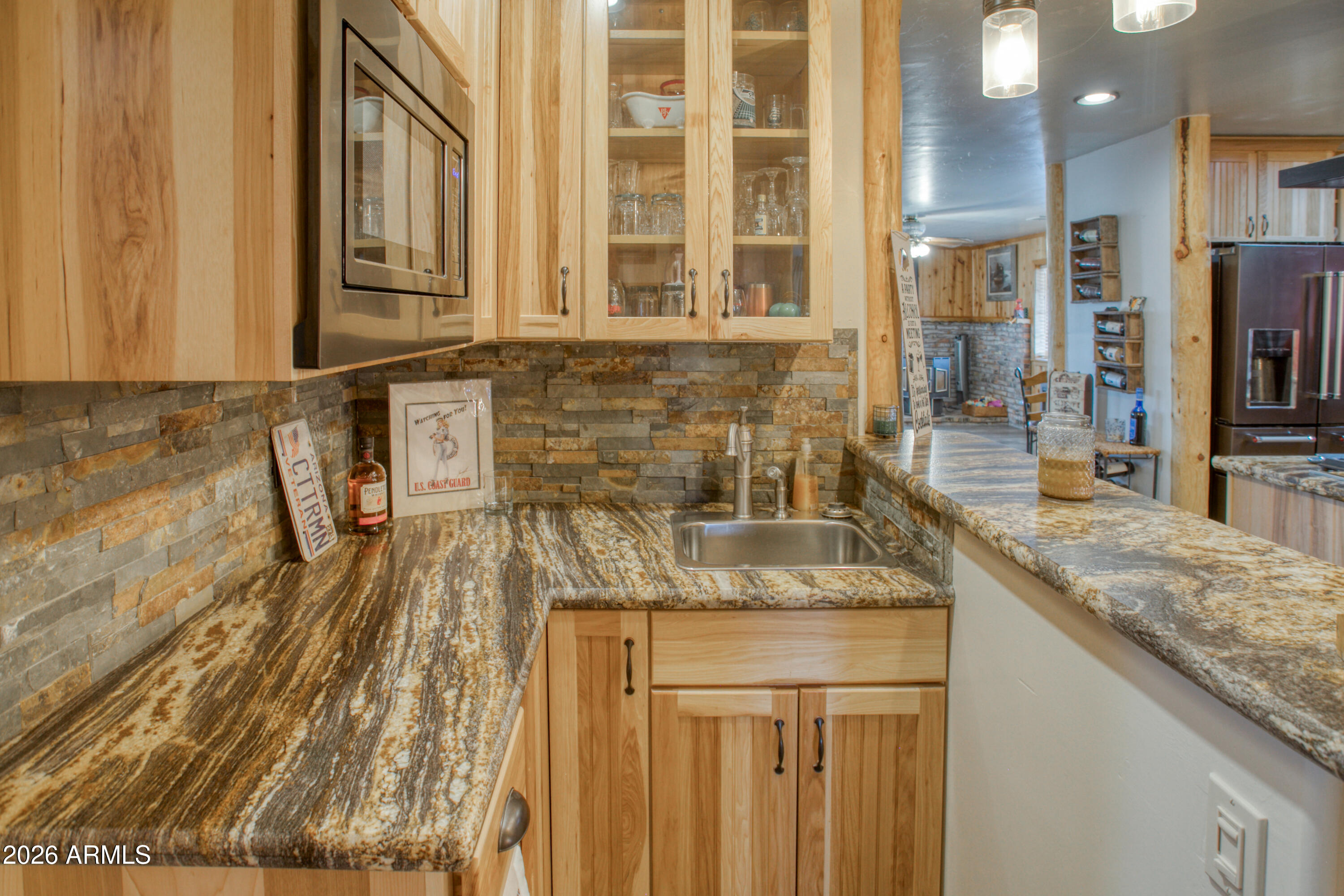 5 Co Road Show Low, AZ 85901 - Photo 13 of 39 a bathroom with a granite countertop sink and a mirror