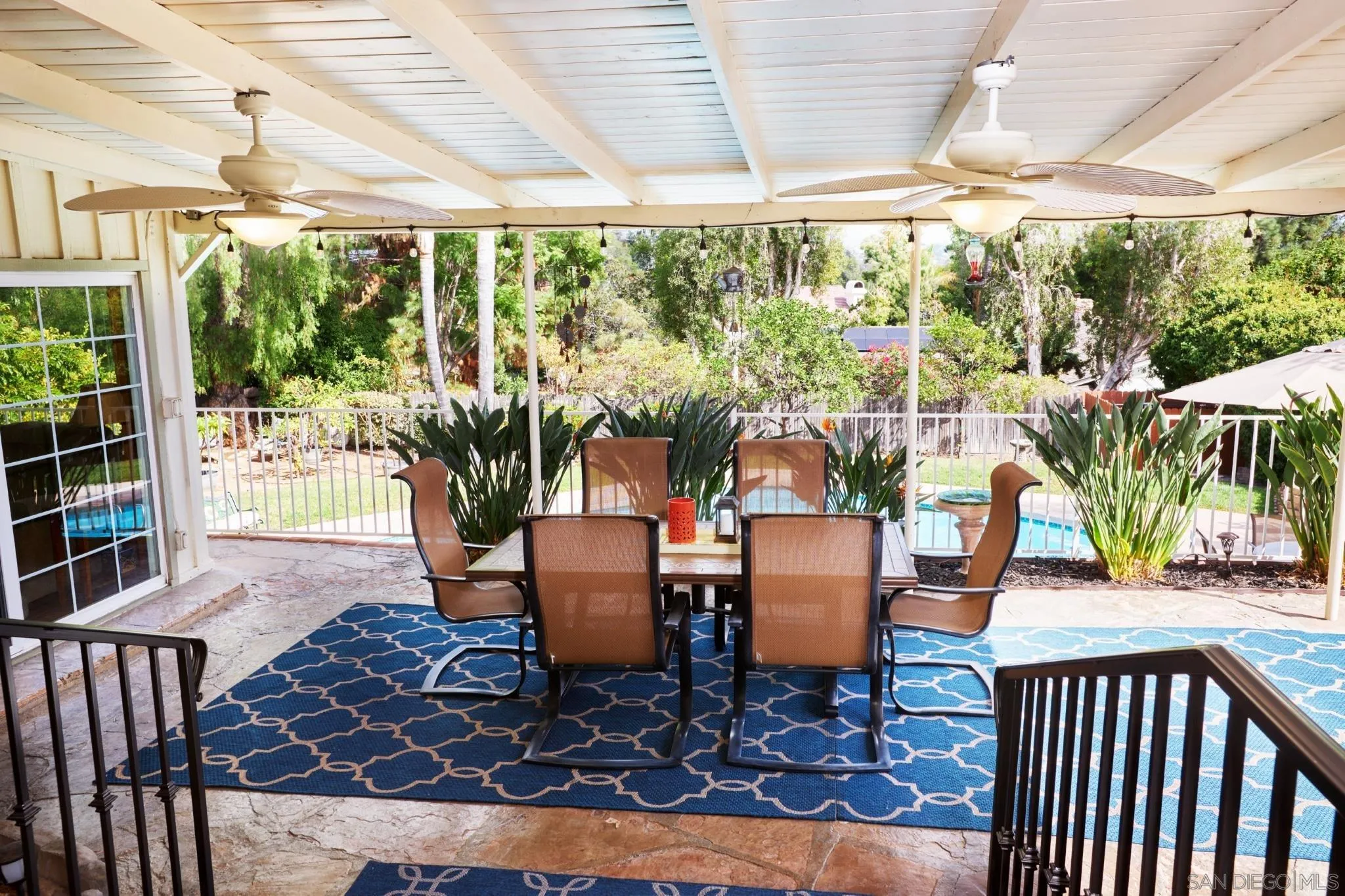 4437 Upland Street La Mesa, CA 91941 - Photo 5 of 24 a dining room with furniture water view and wooden floor