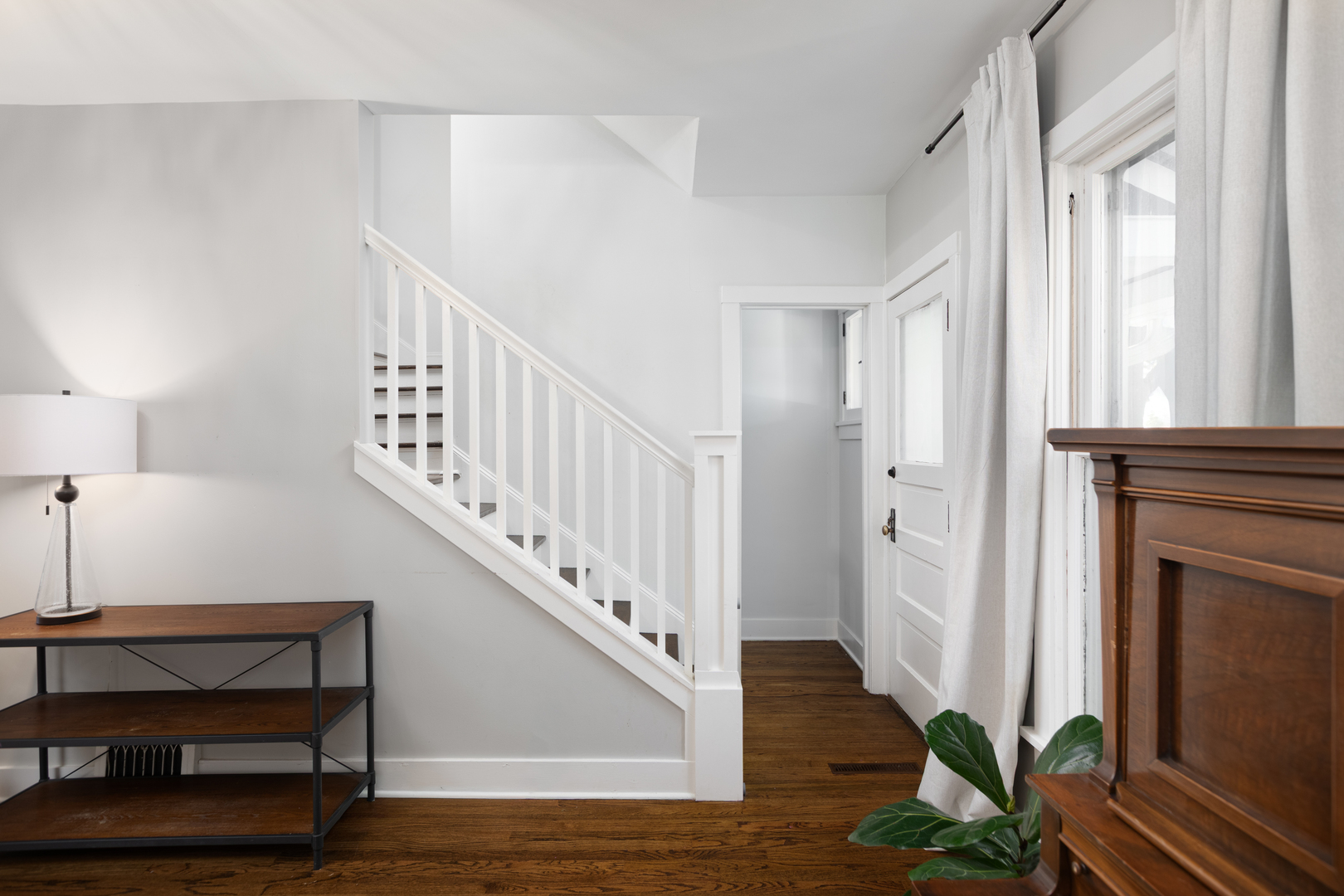 105 South Wright Street Naperville, IL 60540 - Photo 11 of 47 a view of entryway and hall with wooden floor