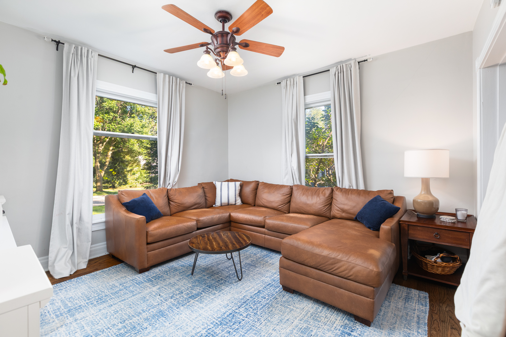 105 South Wright Street Naperville, IL 60540 - Photo 18 of 47 a living room with furniture and a large window