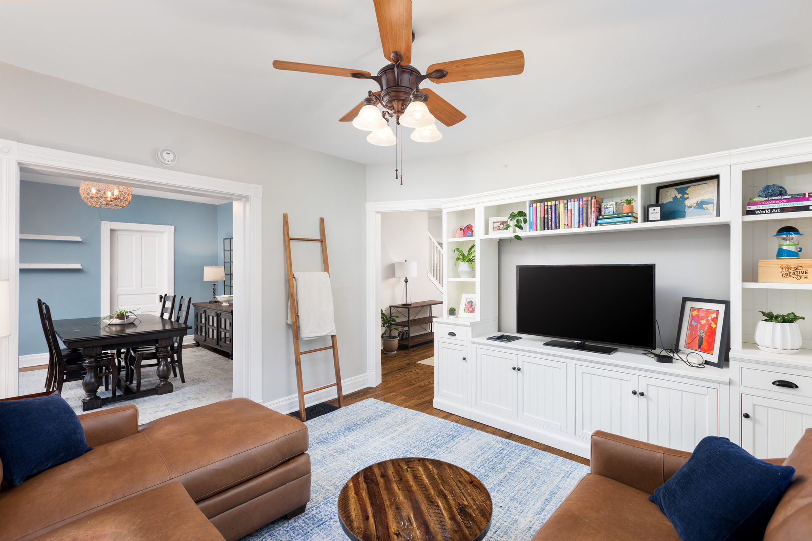 105 South Wright Street Naperville, IL 60540 - Photo 19 of 47 a living room with furniture and a flat screen tv