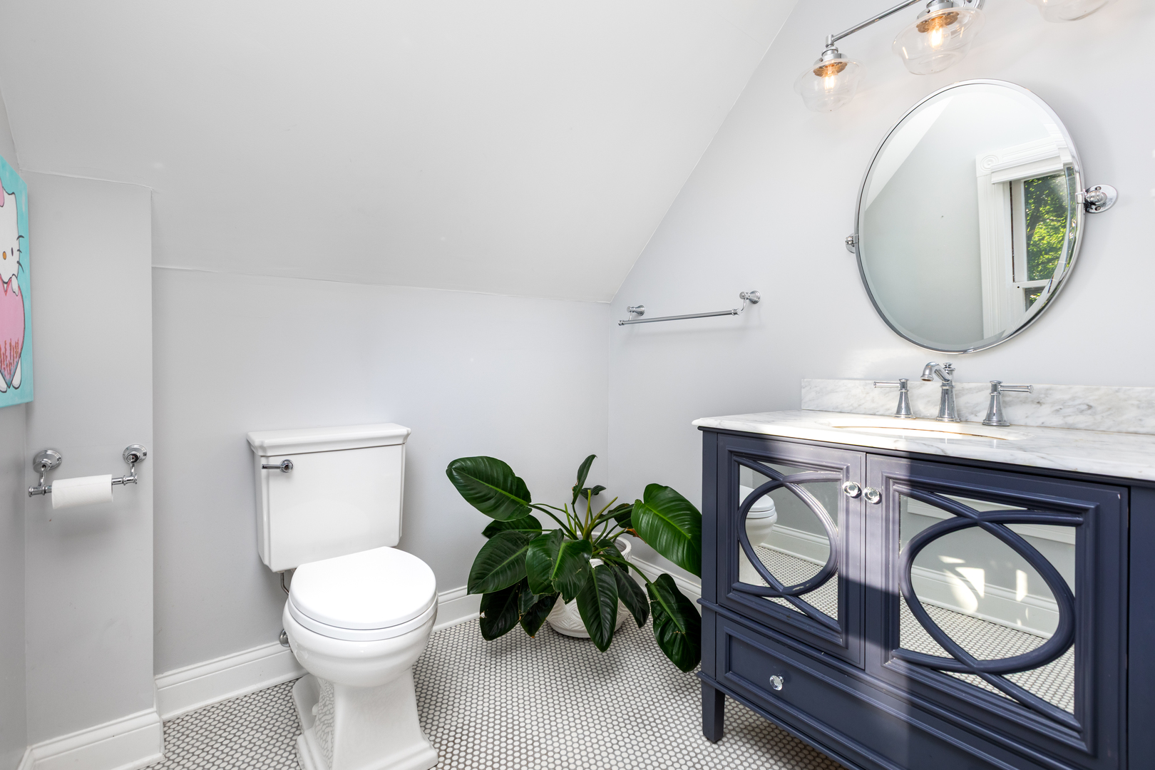 105 South Wright Street Naperville, IL 60540 - Photo 30 of 47 a bathroom with a toilet sink and mirror