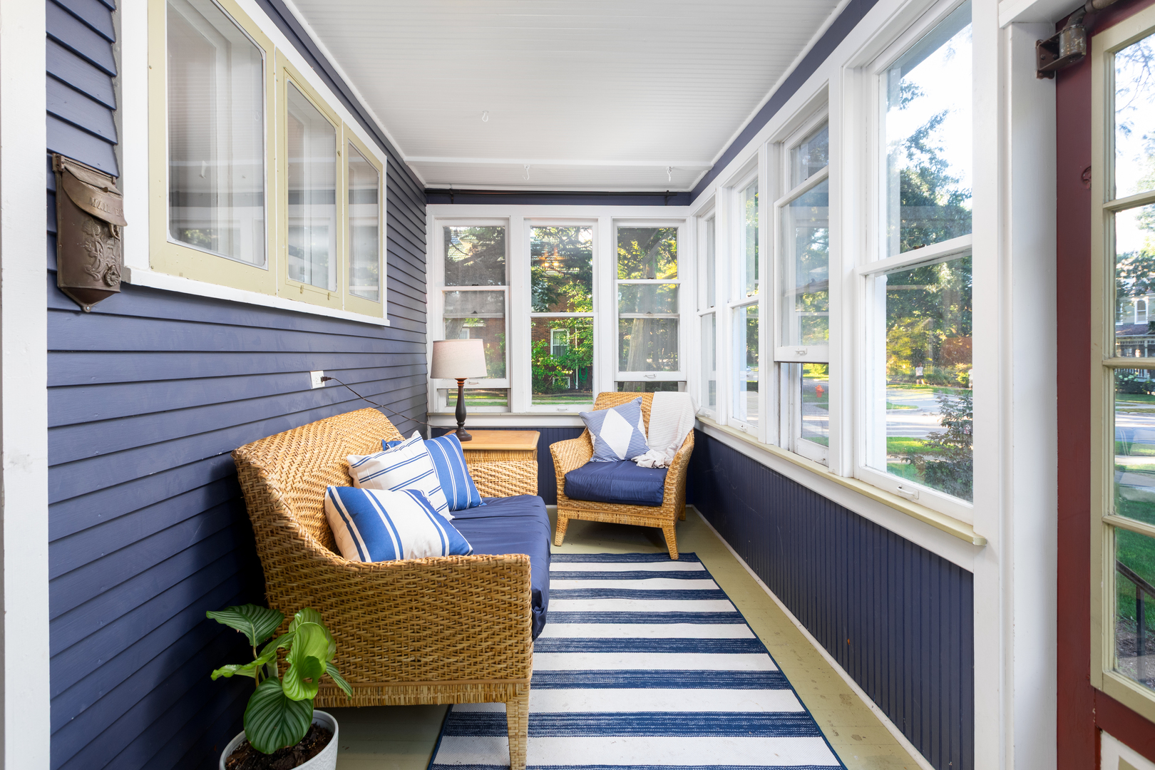 105 South Wright Street Naperville, IL 60540 - Photo 36 of 47 a balcony with furniture and a potted plant